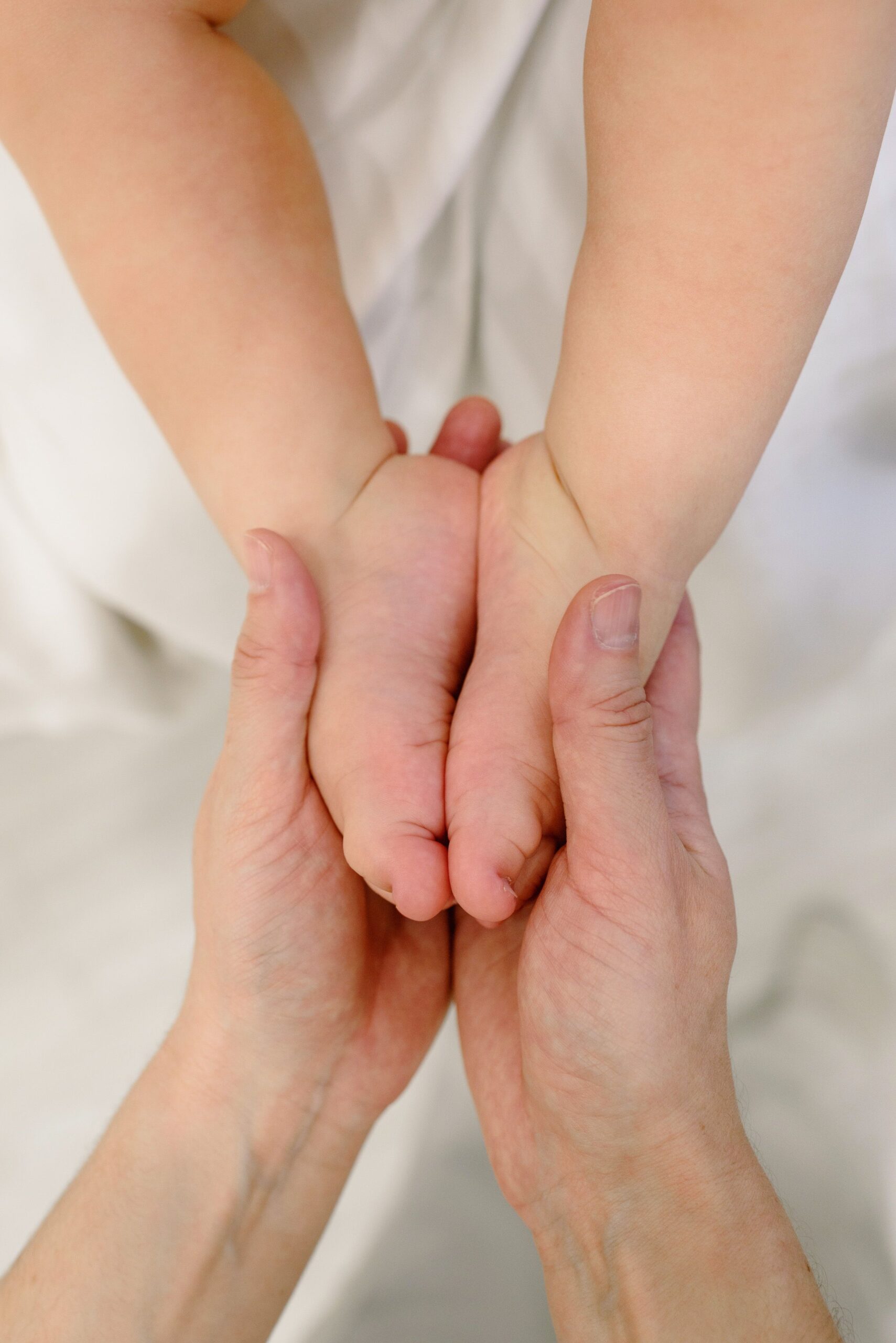 Infant massage coaching session with caregiver