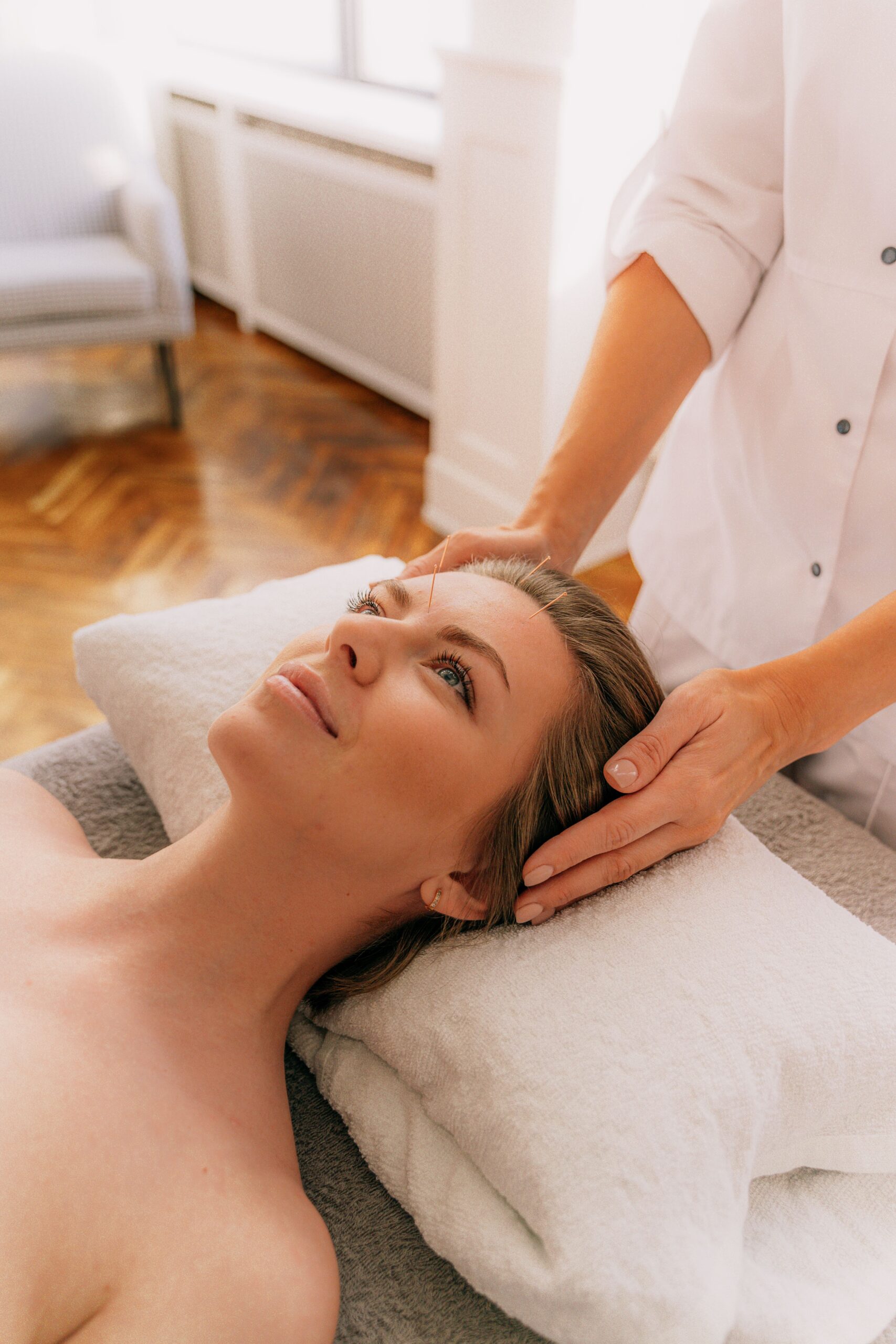 Kelly Konicki providing therapeutic massage at Embody Wellness GA